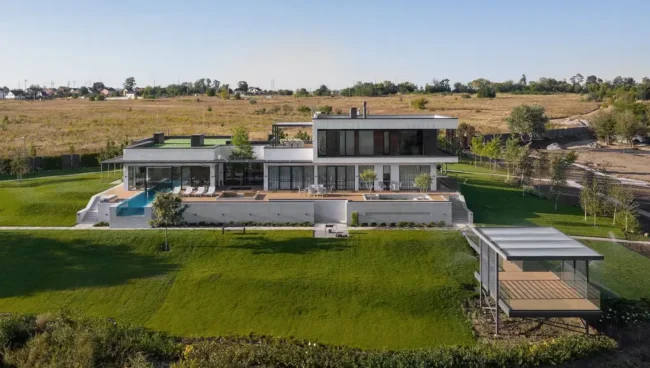 Vin House by Bogdanova Bureau Blends Modern Rationalism with Riverfront Serenity in Ukraine