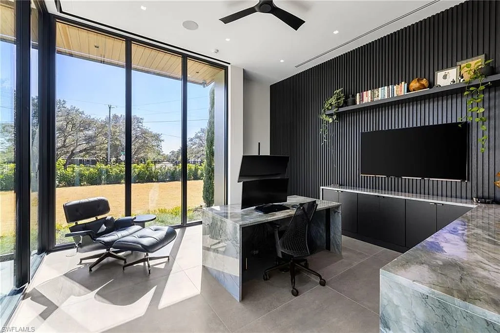 Luxury estate at 107 Myrtle Rd, Naples featuring 5 bedrooms, guest house, lap pool, smart Control4 system, and modern architecture on 1.12-acre lot