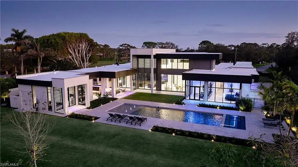 Luxury estate at 107 Myrtle Rd, Naples featuring 5 bedrooms, guest house, lap pool, smart Control4 system, and modern architecture on 1.12-acre lot