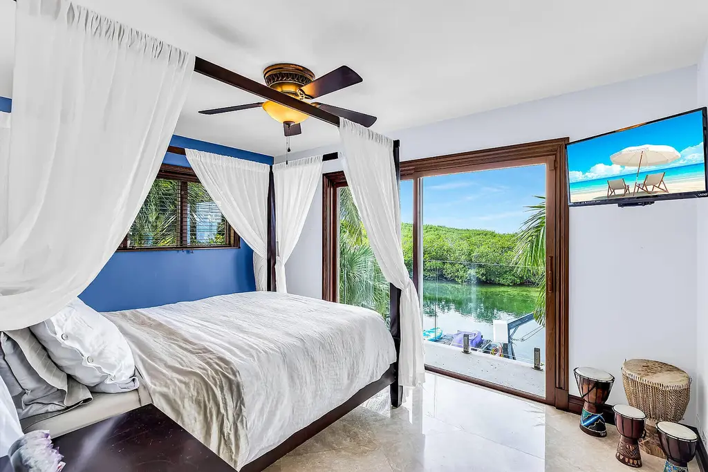Luxury pool with waterfall overlooking Florida Bay at 1112 Venetian Blvd in Venetian Shores