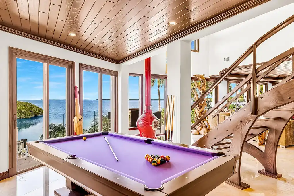 Luxury pool with waterfall overlooking Florida Bay at 1112 Venetian Blvd in Venetian Shores