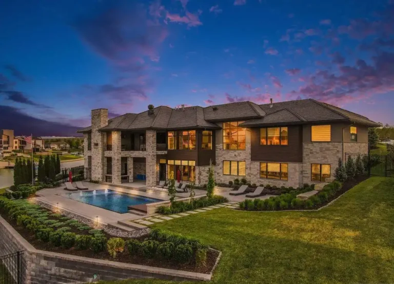 This $2.495M Architectural Gem on Bennington Lake Delivers the Ultimate in Executive Lakeside Living