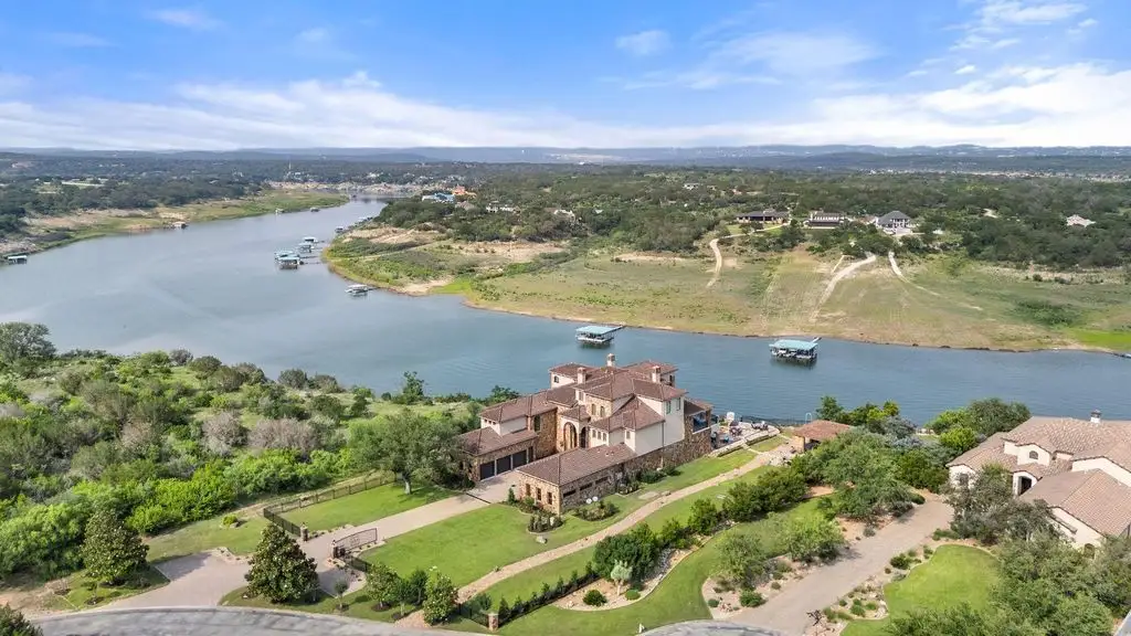 1216 Travis Bluff Way Spectacular Lakefront Estate with Private Tram and Dock Lists for 5.85 Million 1