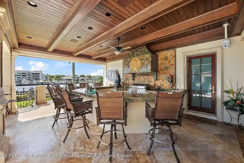 Aerial shot of the waterfront estate at 2330 Seven Oaks Ln with deep-water dock and 150 feet of Intracoastal frontage