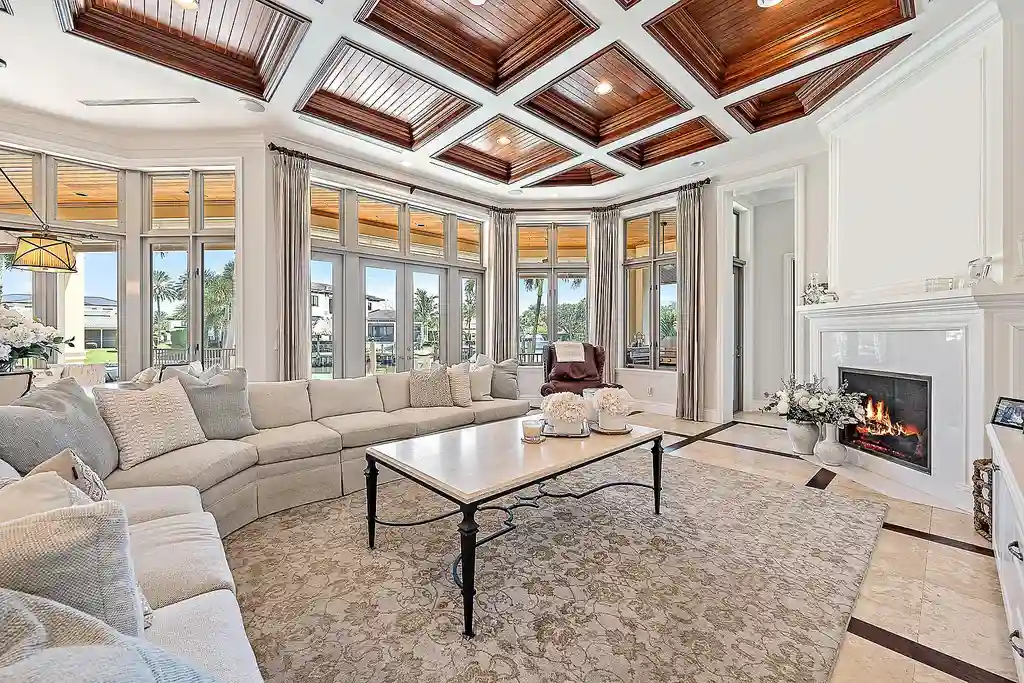 Aerial view of 2365 Azure Circle showing saltwater pool, waterfront dock, and lush landscaping in Palm Beach Gardens Real Estate