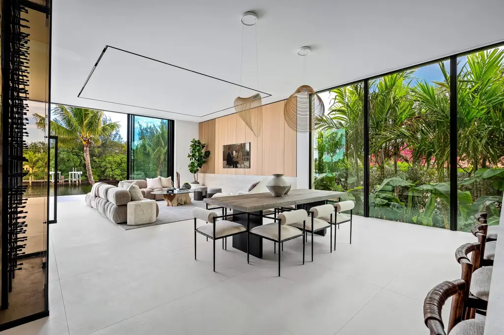 Modern waterfront home at 35 Spoonbill Road Manalapan with white-oak fins and sculptural architecture