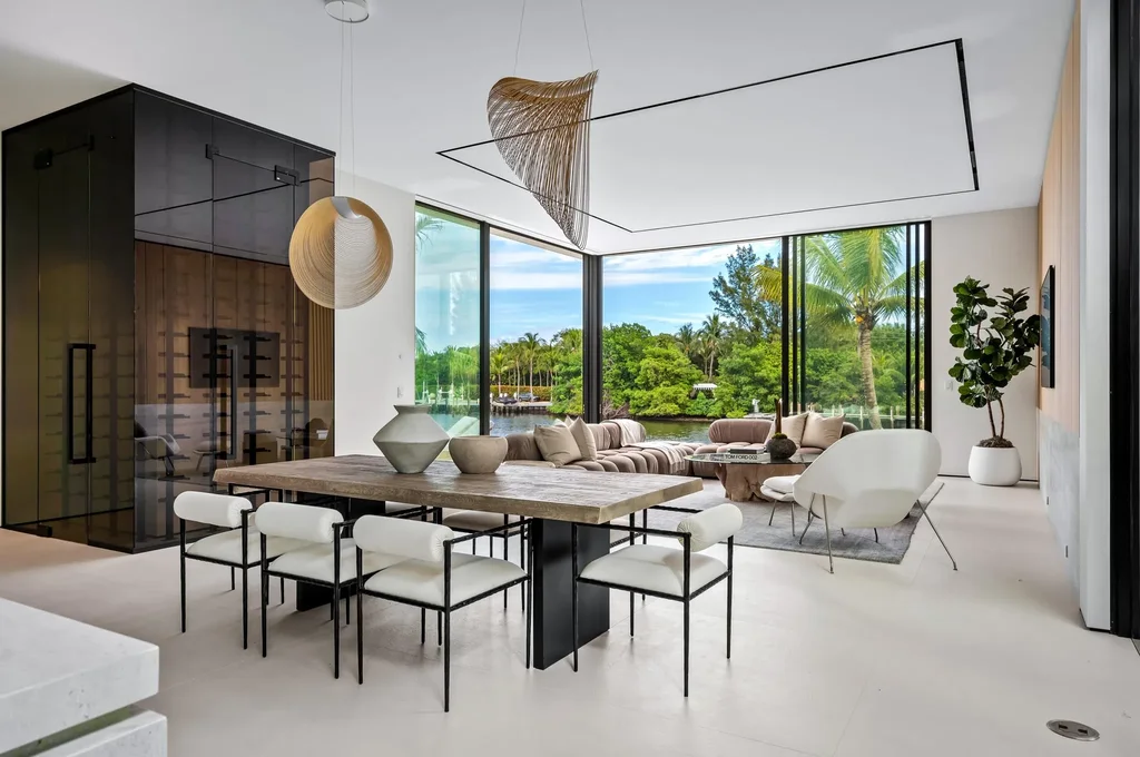 Modern waterfront home at 35 Spoonbill Road Manalapan with white-oak fins and sculptural architecture