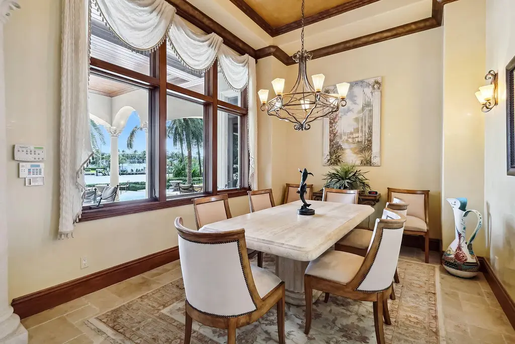 Luxury waterfront estate at 3870 NE 31st Avenue in Lighthouse Point with private dock, pool, and Mediterranean architecture
