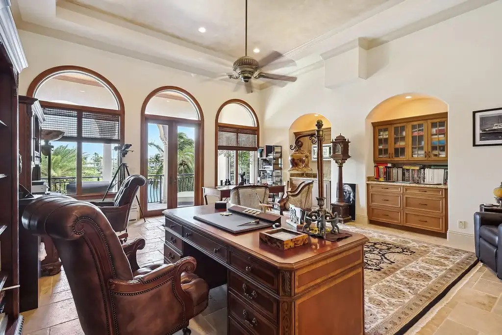 Luxury waterfront estate at 3870 NE 31st Avenue in Lighthouse Point with private dock, pool, and Mediterranean architecture