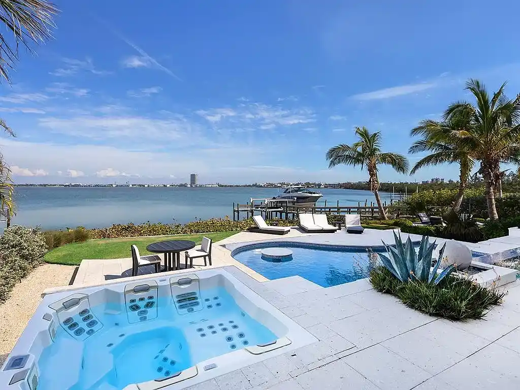 Infinity-edge saltwater pool at 424 Bowdoin Cir overlooking Sarasota Bay