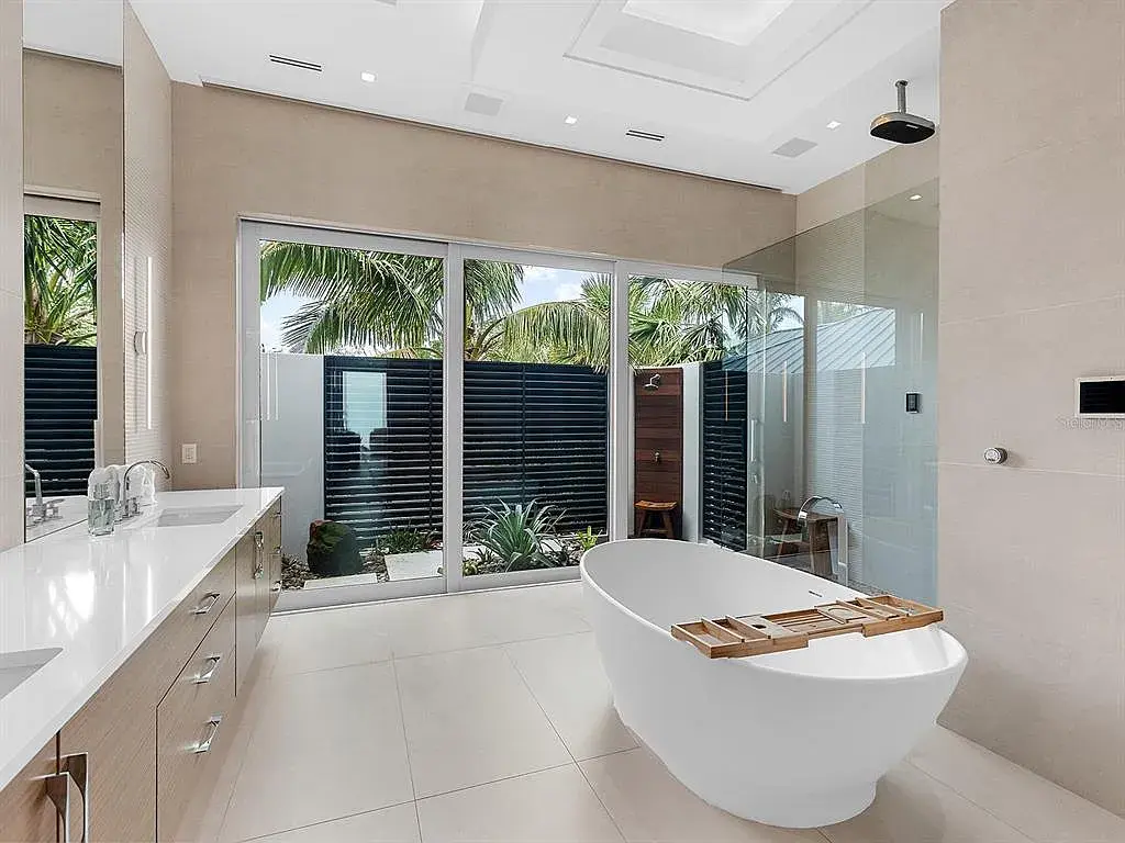 Infinity-edge saltwater pool at 424 Bowdoin Cir overlooking Sarasota Bay
