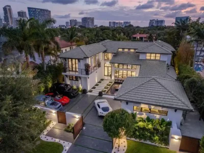 4241 Palm Ln Lists for 24.9M Spectacular Waterfront Home in Miami With Private Dock Infinity Pool and Modern Elegance 1