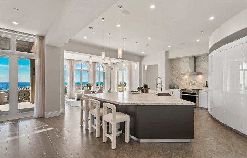 A Breathtaking Architectural Masterpiece at 22 Pelican Crest Dr Redefines Coastal Luxury — 29 9