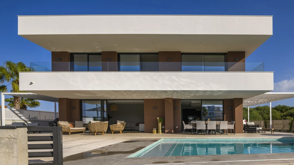 House by the Water by Albasini Berkhout A Dutch Spanish Lagoon Retreat with Seamless Indoor Outdoor Living 10