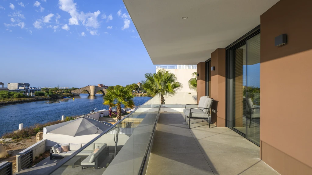 House by the Water by Albasini Berkhout A Dutch Spanish Lagoon Retreat with Seamless Indoor Outdoor Living 8 1