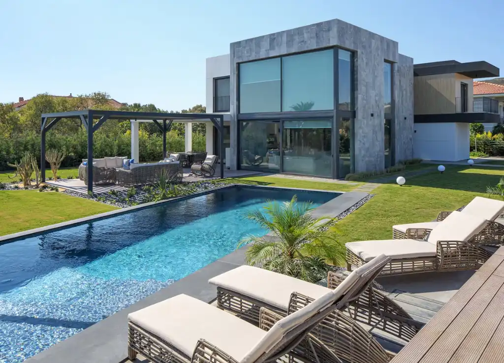 Villa Mass by Basak Akkoyunlu Design A Sculpted Stone Villa That Plays with Light Mass and Void 10