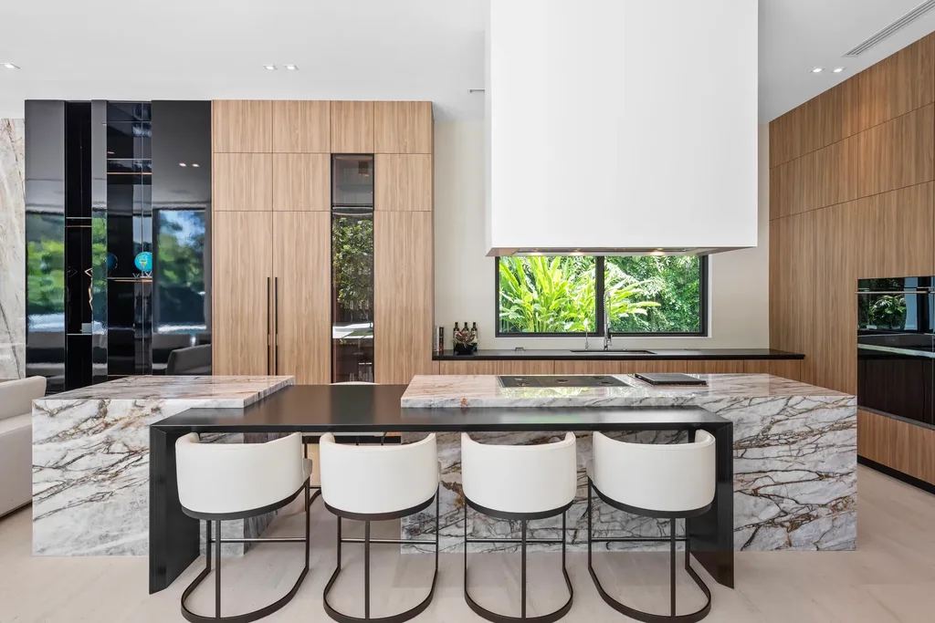 10840 Old Cutler Rd Coral Gables luxury estate with modern architecture by Giorgio Balli, surrounded by oak trees in Snapper Creek Lakes