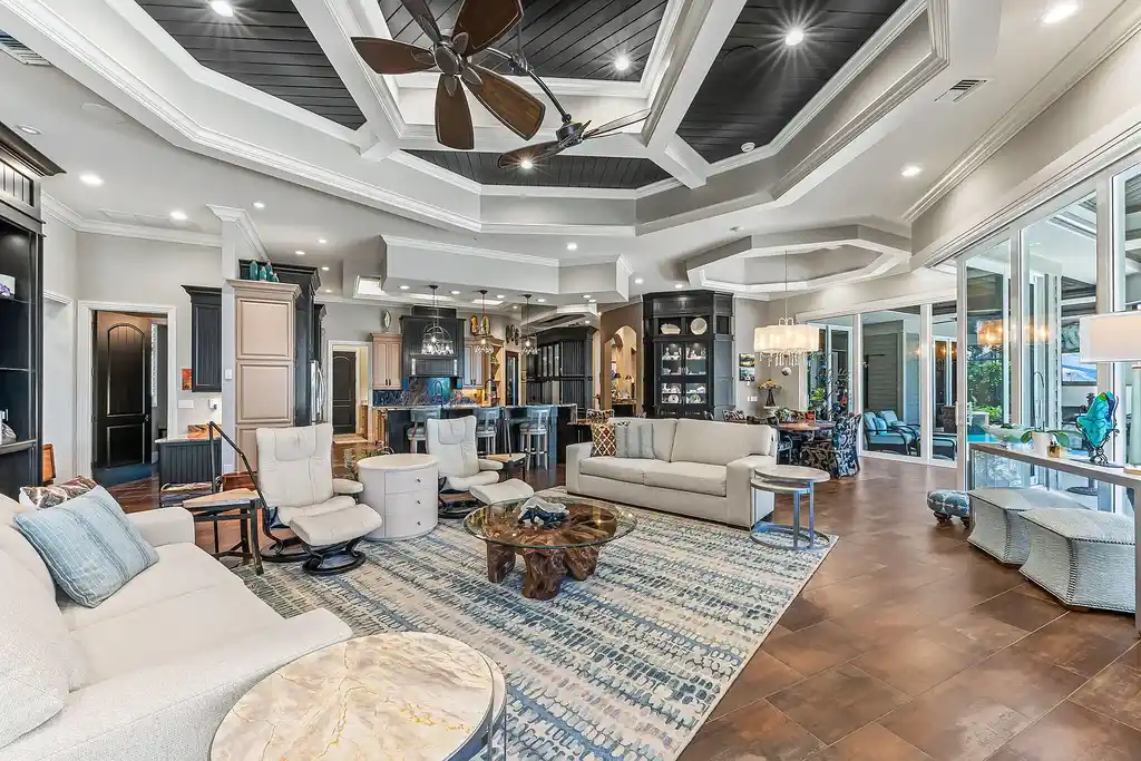 Front view of 1611 Collingswood Ct, a luxurious $8.9M waterfront home in Marco Island with Gulf access, infinity pool, and expansive lanai – a standout in Marco Island real estate.