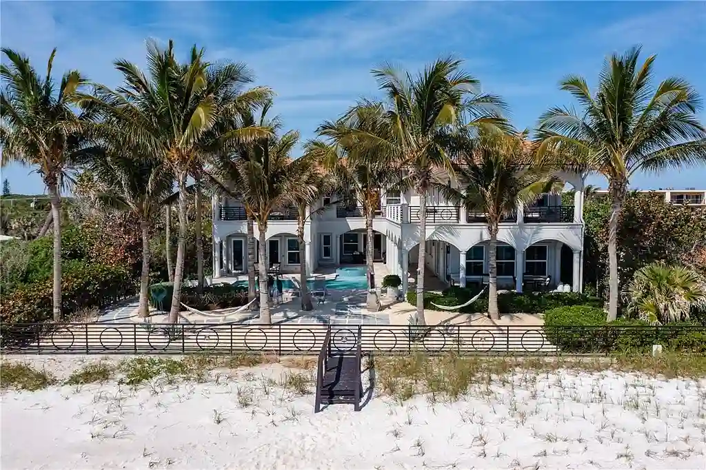 Luxury oceanfront estate at 3756 Ocean Dr, Vero Beach featuring panoramic Atlantic views, 6 bedrooms, 8 baths, heated pool, and coastal modern design.
