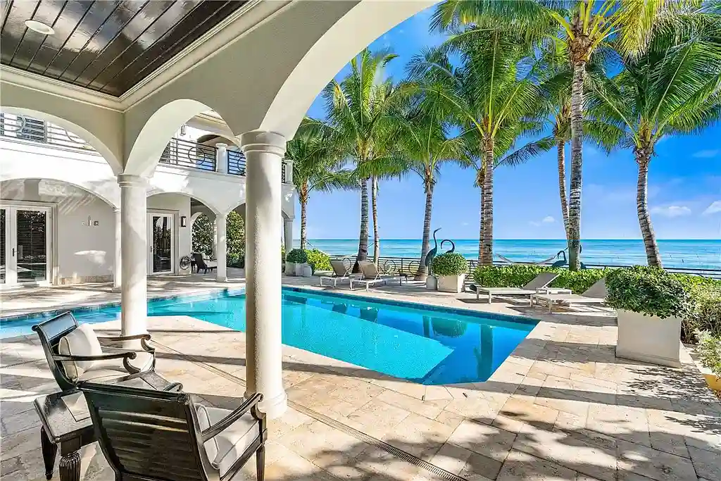 Luxury oceanfront estate at 3756 Ocean Dr, Vero Beach featuring panoramic Atlantic views, 6 bedrooms, 8 baths, heated pool, and coastal modern design.