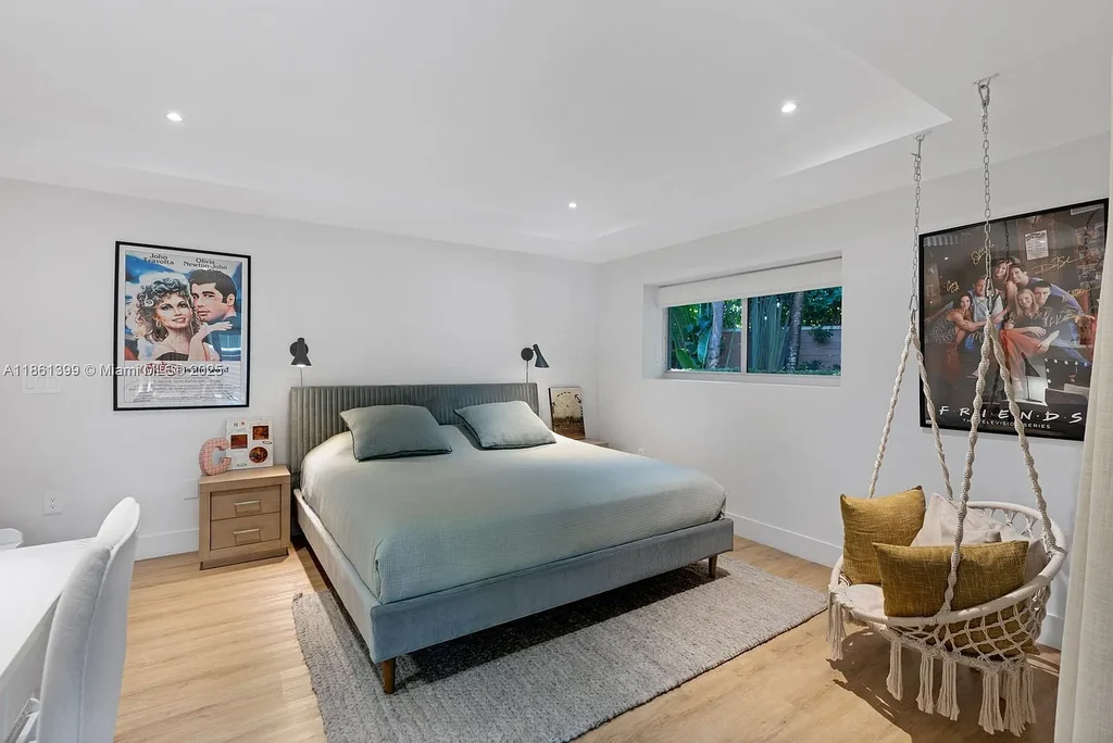 144 N Prospect Dr Coral Gables home for sale – $5.39M luxury residence designed by Hilario Candela featuring modern updates, private pool, and lush greenery.