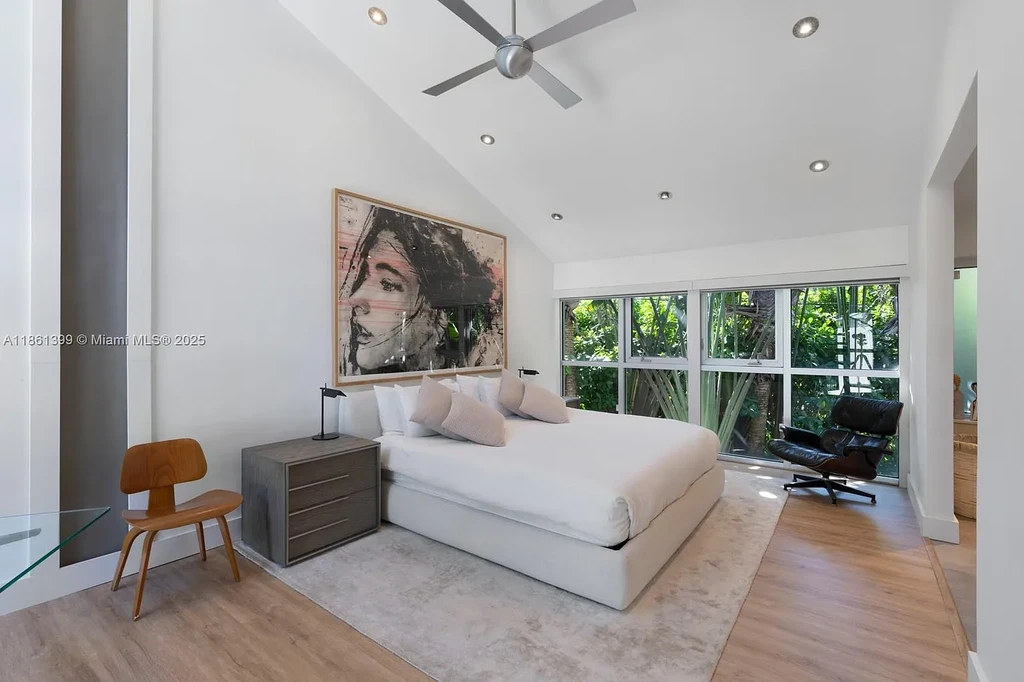 144 N Prospect Dr Coral Gables home for sale – $5.39M luxury residence designed by Hilario Candela featuring modern updates, private pool, and lush greenery.