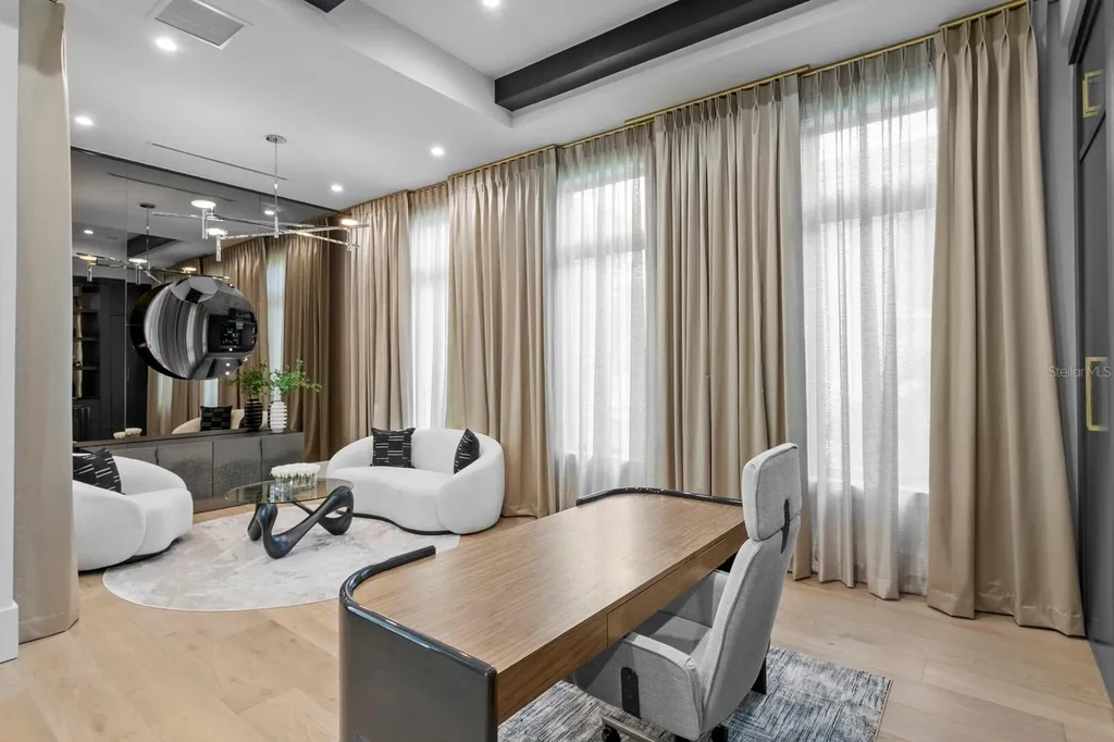 Luxury waterfront home in Tampa – front exterior of 5107 W Homer Ave with modern coastal design