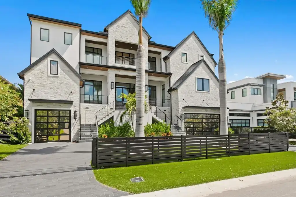Luxury waterfront home in Tampa – front exterior of 5107 W Homer Ave with modern coastal design