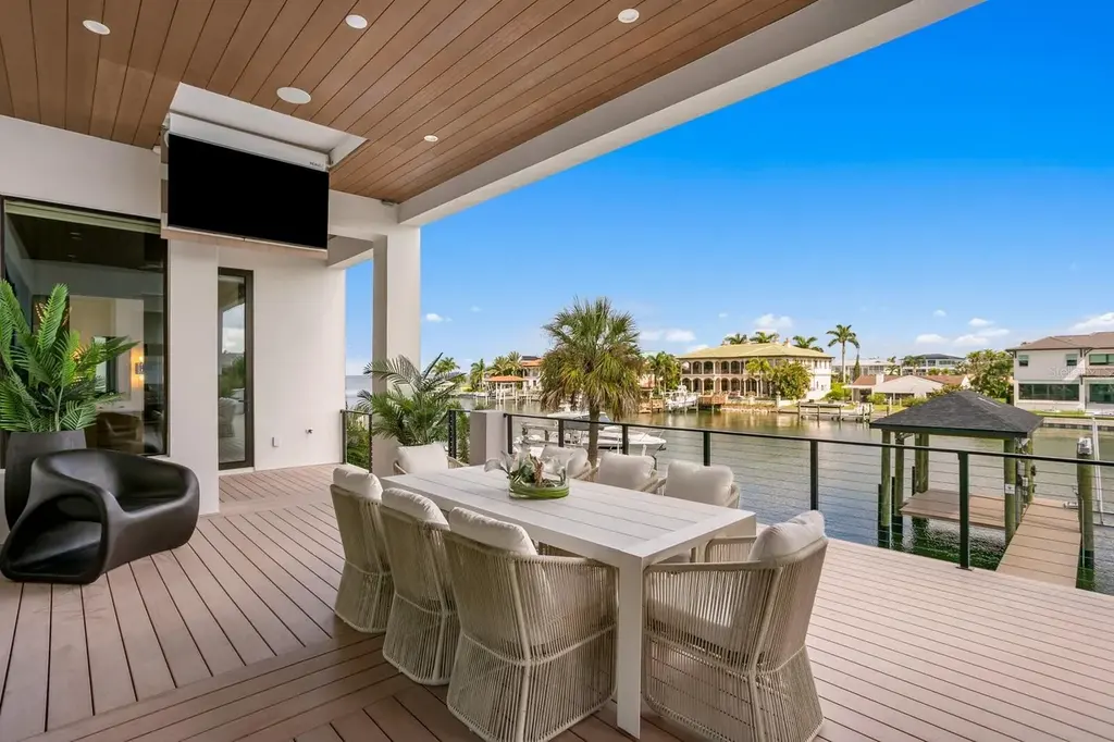 Luxury waterfront home in Tampa – front exterior of 5107 W Homer Ave with modern coastal design