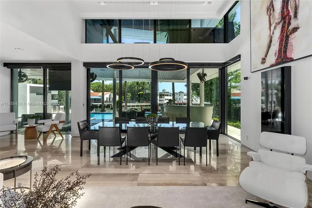 Aerial view of 528 Lakeview Ct modern waterfront estate in Miami Beach with luxury pool, private dock, and panoramic Intracoastal views