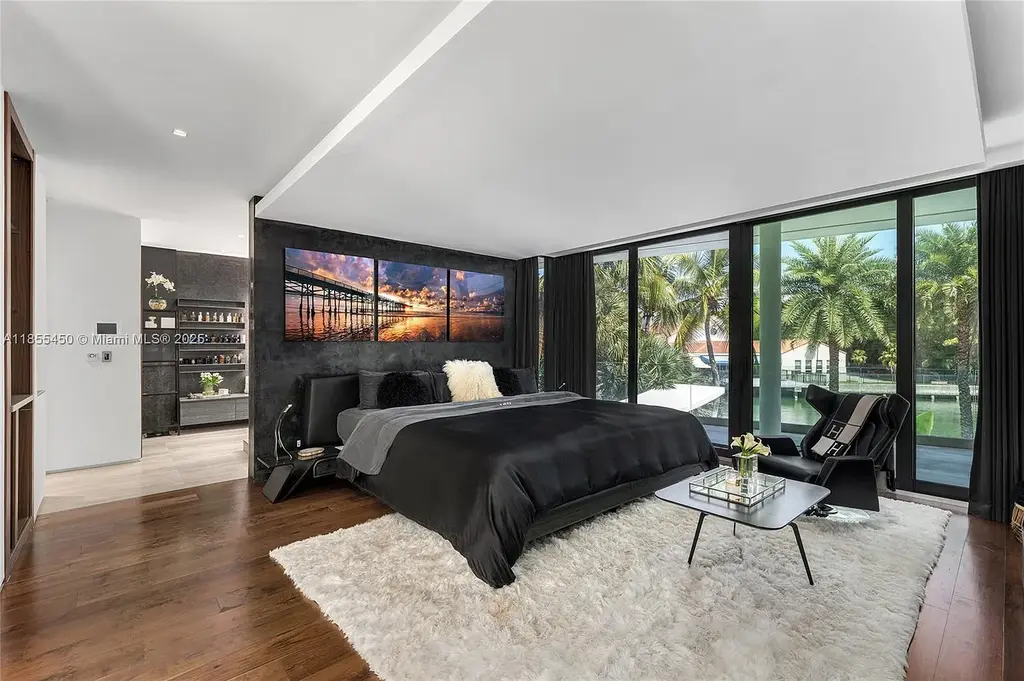 Aerial view of 528 Lakeview Ct modern waterfront estate in Miami Beach with luxury pool, private dock, and panoramic Intracoastal views