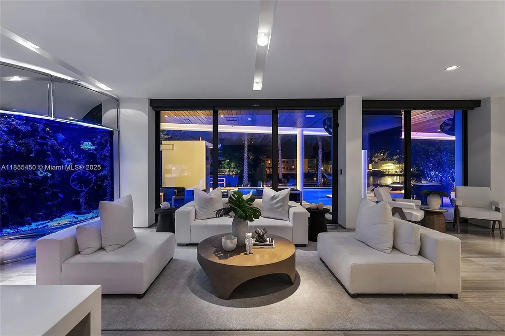 Aerial view of 528 Lakeview Ct modern waterfront estate in Miami Beach with luxury pool, private dock, and panoramic Intracoastal views