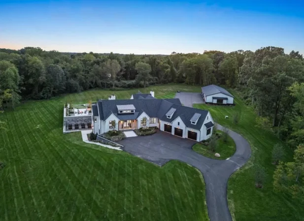 A Captivating $5.8M Modern Farmhouse Offering 13 Acres of Privacy in Rochester Hills