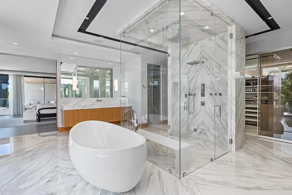 Exterior view of 650 Royal Plaza Dr, a $19.75M modern smart-home waterfront estate in Fort Lauderdale featuring 131 feet of canal frontage and luxury amenities.