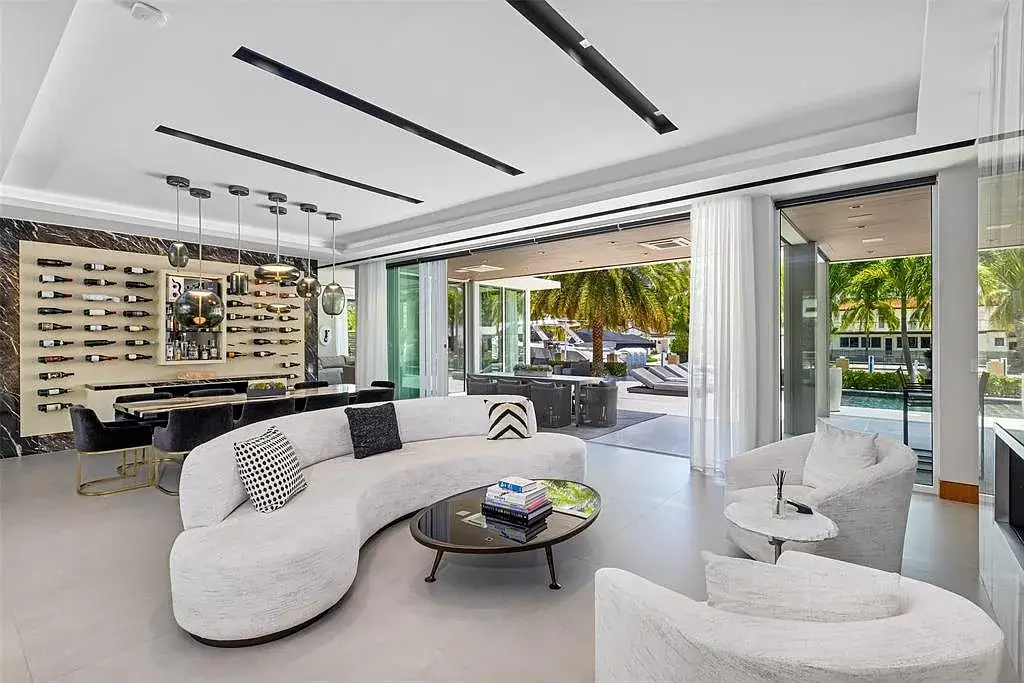 Exterior view of 650 Royal Plaza Dr, a $19.75M modern smart-home waterfront estate in Fort Lauderdale featuring 131 feet of canal frontage and luxury amenities.