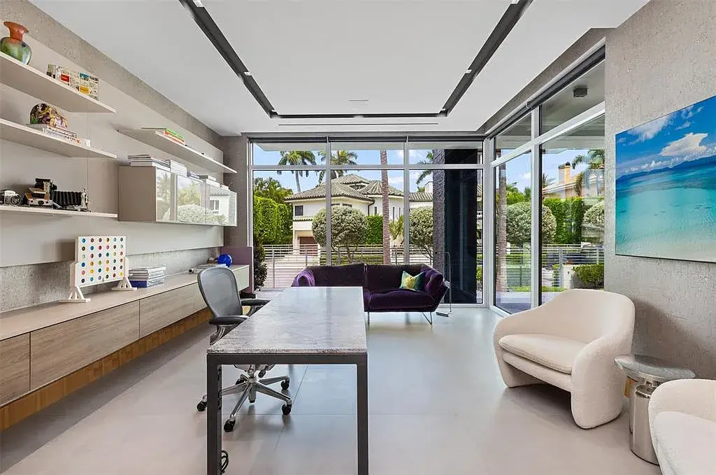 Exterior view of 650 Royal Plaza Dr, a $19.75M modern smart-home waterfront estate in Fort Lauderdale featuring 131 feet of canal frontage and luxury amenities.