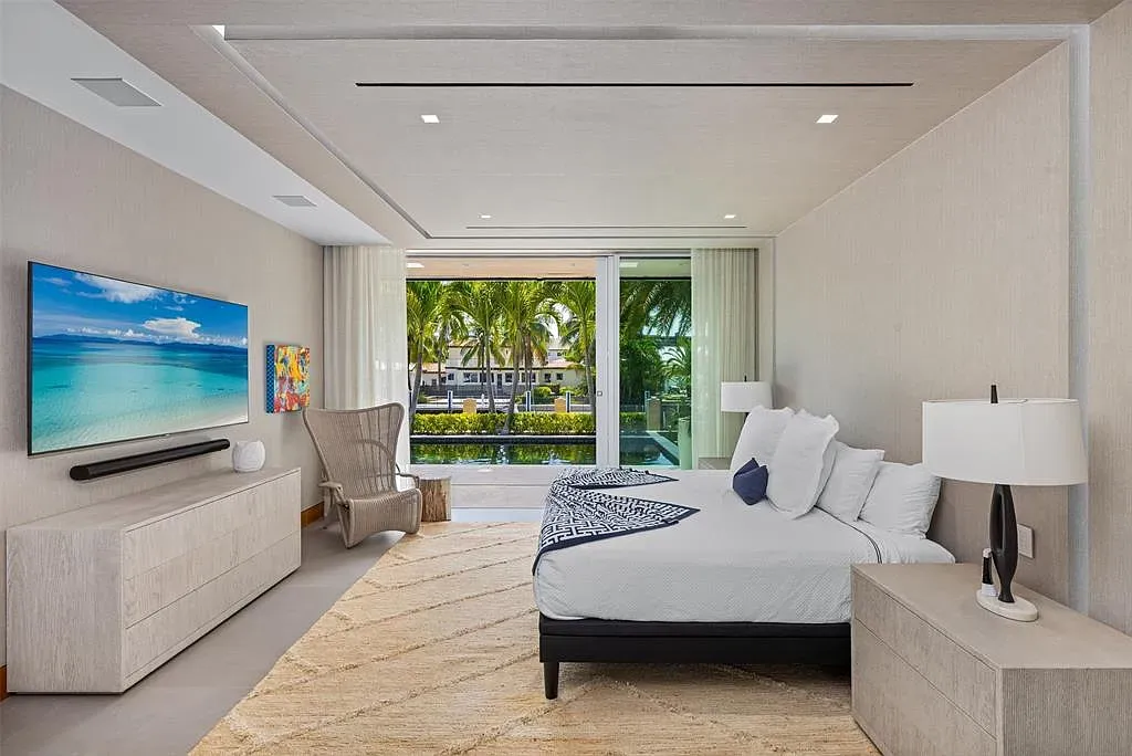 Exterior view of 650 Royal Plaza Dr, a $19.75M modern smart-home waterfront estate in Fort Lauderdale featuring 131 feet of canal frontage and luxury amenities.