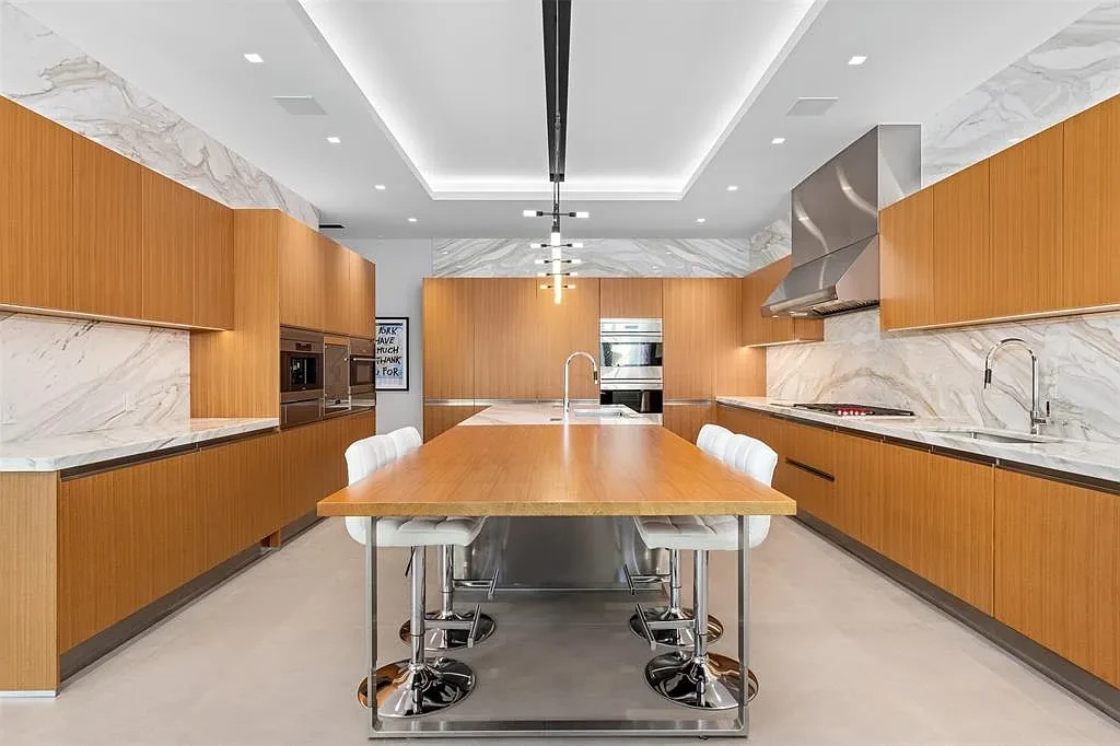 Exterior view of 650 Royal Plaza Dr, a $19.75M modern smart-home waterfront estate in Fort Lauderdale featuring 131 feet of canal frontage and luxury amenities.