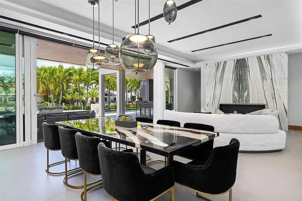 Exterior view of 650 Royal Plaza Dr, a $19.75M modern smart-home waterfront estate in Fort Lauderdale featuring 131 feet of canal frontage and luxury amenities.