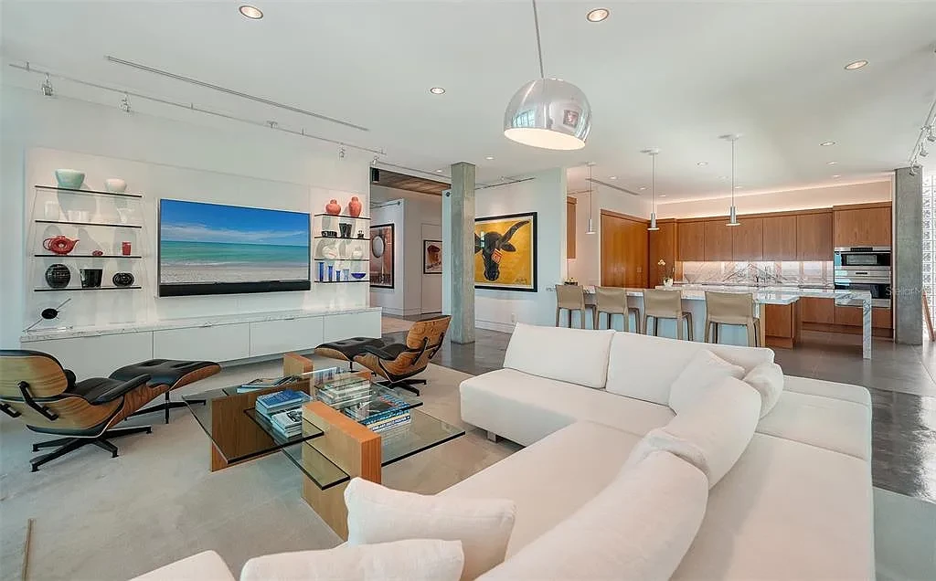 Gulf-front luxury home at 8250 Sanderling Rd in Sarasota, award-winning modern architecture with beach and lagoon frontage.