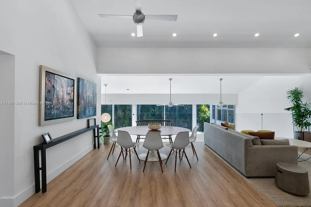 144 N Prospect Dr Coral Gables home for sale – $5.39M luxury residence designed by Hilario Candela featuring modern updates, private pool, and lush greenery.