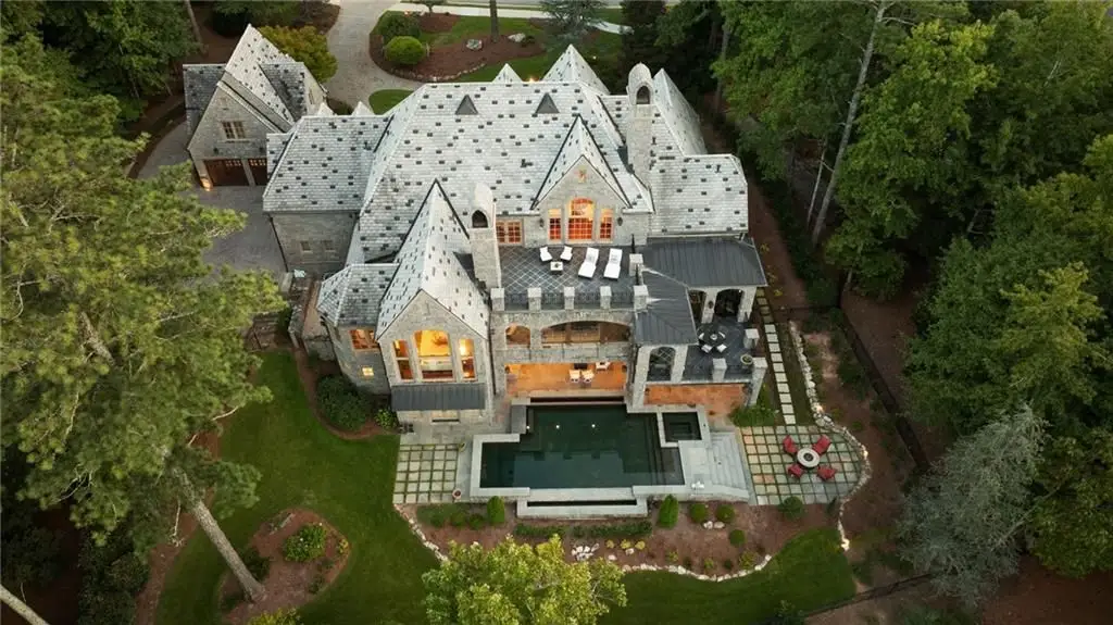 Discover The Castle at 929 Middle Fork Trl An Extraordinary 3.875M Italian Limestone Estate in Georgia 4