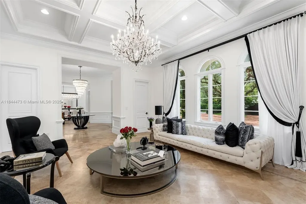 Luxury Mediterranean estate at 5001 Pine Dr. Miami featuring resort-style pool and private oasis