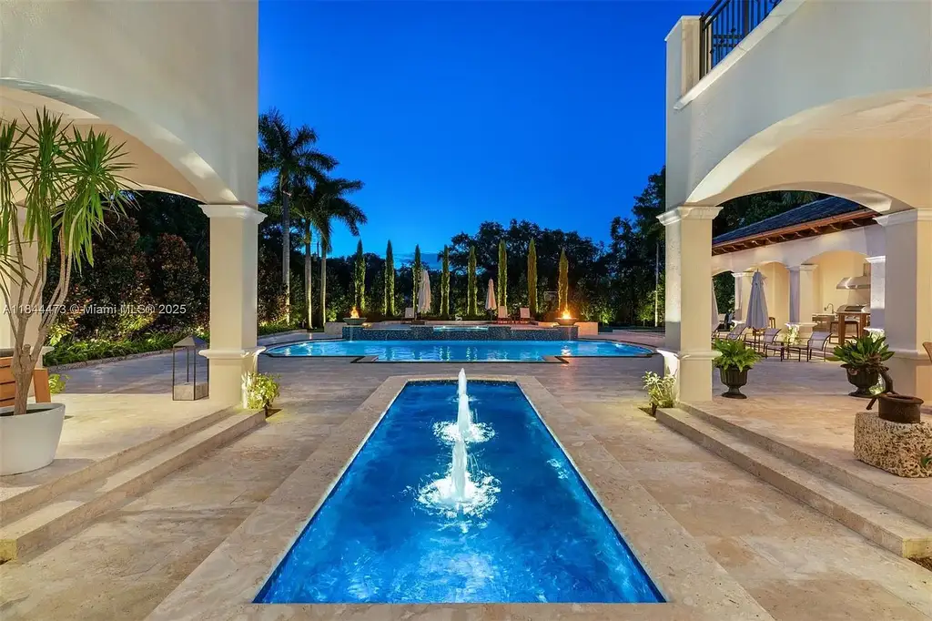 Luxury Mediterranean estate at 5001 Pine Dr. Miami featuring resort-style pool and private oasis