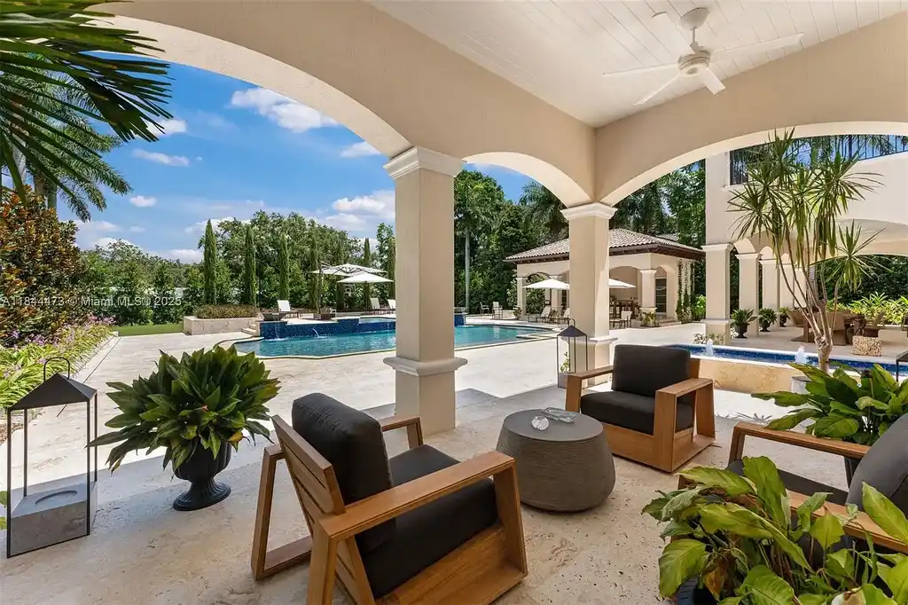 Luxury Mediterranean estate at 5001 Pine Dr. Miami featuring resort-style pool and private oasis