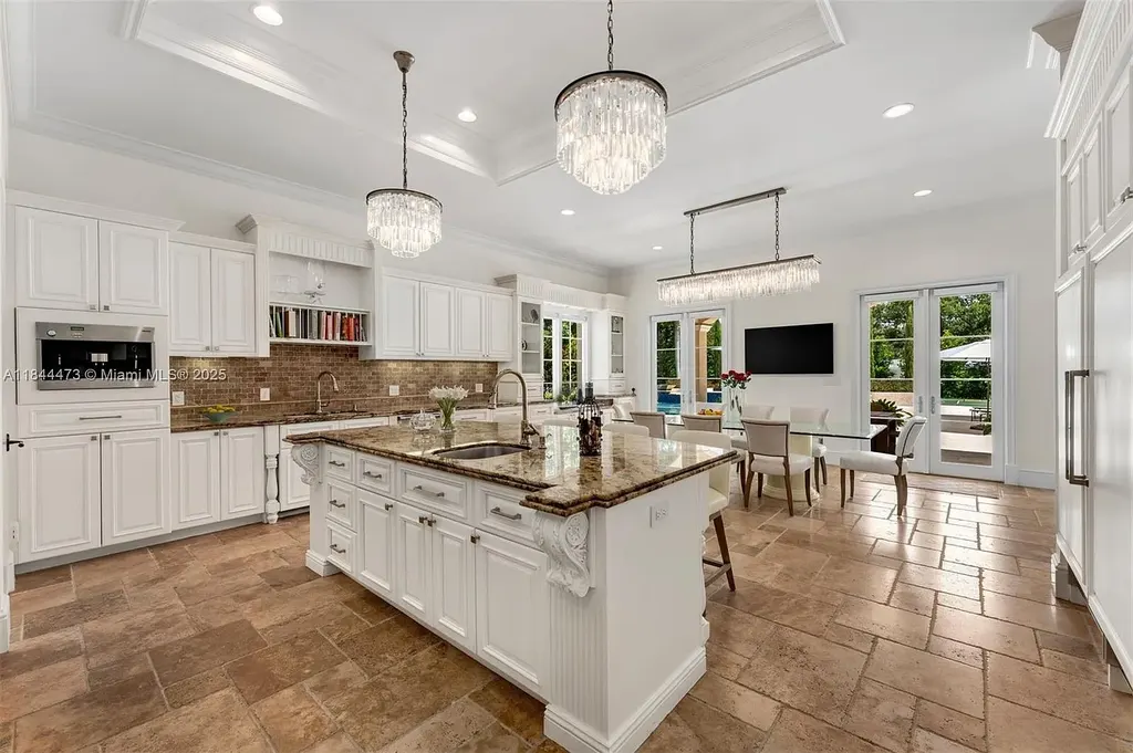Luxury Mediterranean estate at 5001 Pine Dr. Miami featuring resort-style pool and private oasis