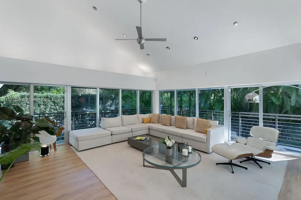 144 N Prospect Dr Coral Gables home for sale – $5.39M luxury residence designed by Hilario Candela featuring modern updates, private pool, and lush greenery.