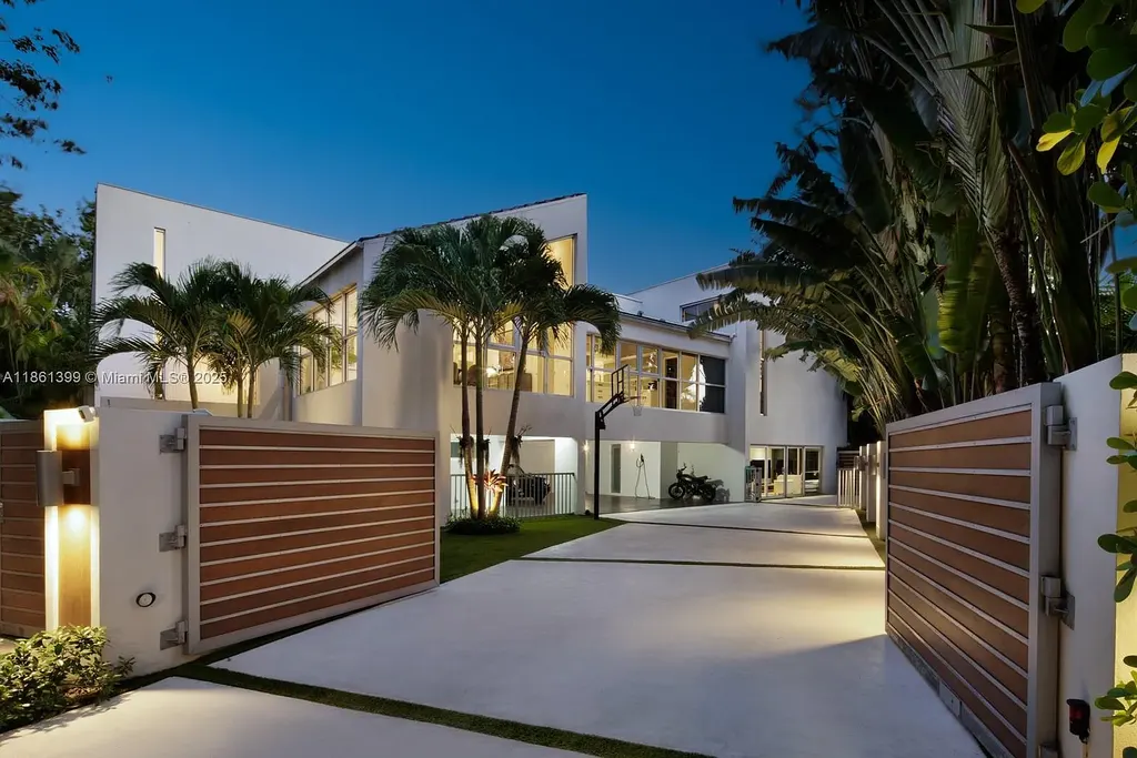 144 N Prospect Dr Coral Gables home for sale – $5.39M luxury residence designed by Hilario Candela featuring modern updates, private pool, and lush greenery.