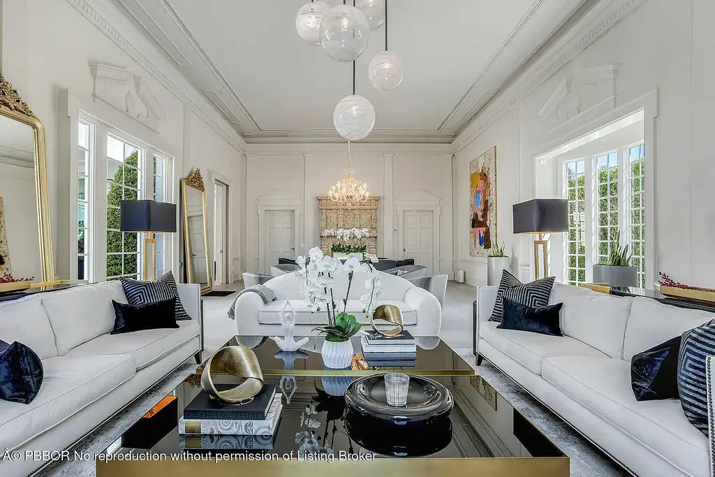 134 Casa Bendita Palm Beach luxury home for sale featuring 4 bedrooms, 5 baths, private pool, sun-drenched great room, and elegant Regency architecture.