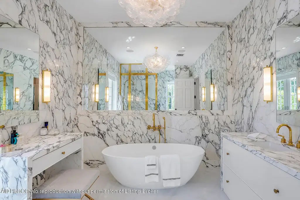 134 Casa Bendita Palm Beach luxury home for sale featuring 4 bedrooms, 5 baths, private pool, sun-drenched great room, and elegant Regency architecture.
